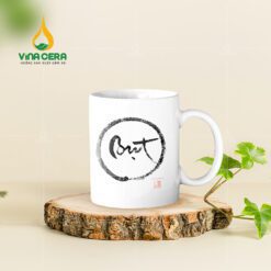 Ly sứ trắng trụ quai C vẽ thư pháp