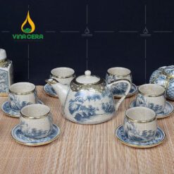 Bộ Ấm Trà Men Rạn Bọc Đồng Dáng Chuông Quai Sứ Họa Tiết Sơn Thủy - BTMR-0162424 Bộ ấm trà men rạn bọc đồng dáng chuông quai sứ họa tiết sơn thủy