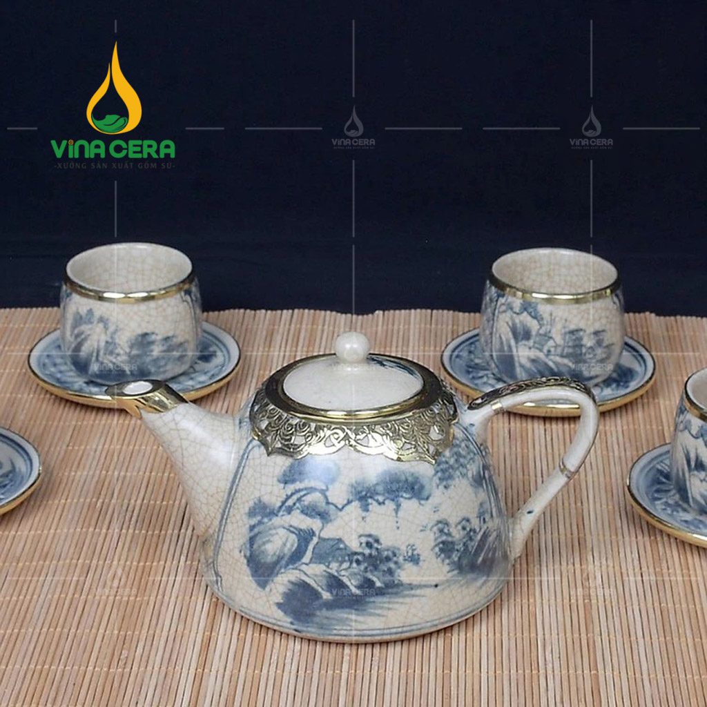 Bộ Ấm Trà Men Rạn Bọc Đồng Dáng Chuông Quai Sứ Họa Tiết Sơn Thủy - BTMR-0162424 Bộ ấm trà men rạn bọc đồng dáng chuông quai sứ họa tiết sơn thủy