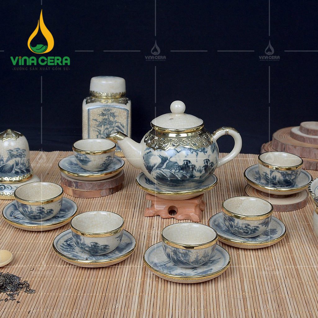 Bộ ấm trà men rạn bọc đồng dáng quả hồng họa tiết sơn thủy