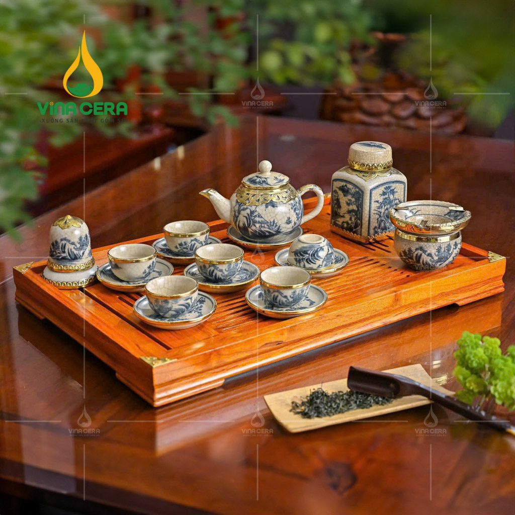 Bộ ấm trà men rạn bọc đồng họa tiết sơn thủy