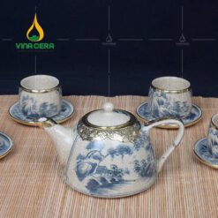 Bộ ấm trà men rạn bọc đồng dáng chuông quai sứ họa tiết sơn thủy