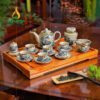 Bộ Ấm Trà Men Rạn Cổ Bọc Đồng Họa Tiết Sơn Thủy - BTMR-1362524 Bộ ấm trà men rạn cổ bọc đồng họa tiết sơn thủy