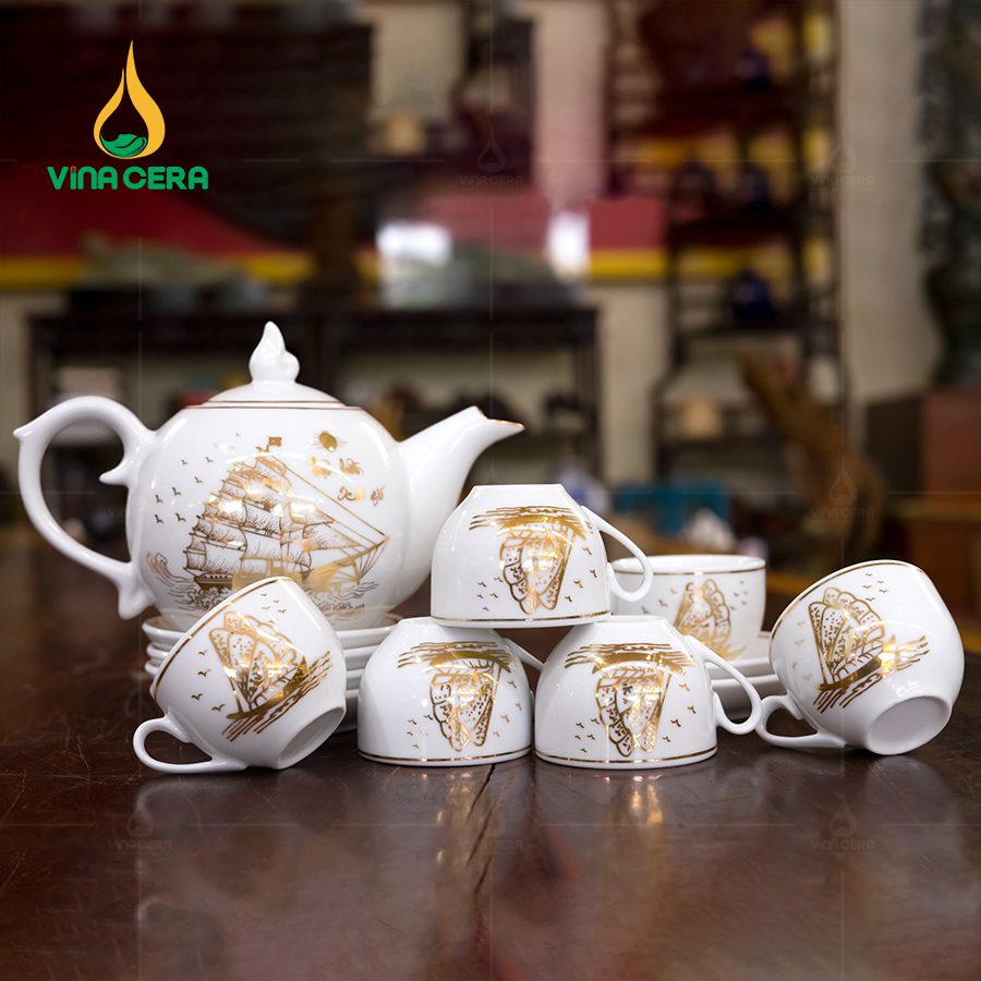 Bộ ấm Trà Dáng Bưởi Chóp Ngọn Lửa Vẽ Vàng (1) Bộ ấm Trà Dáng Bưởi Chóp Ngọn Lửa Vẽ Vàng VN AC 50