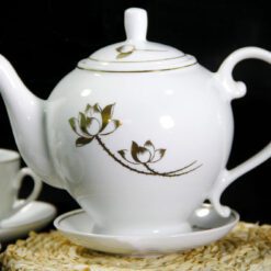 Bộ trà Camelia Sen Vàng kẻ chỉ vàng in logo VNAC12 Bộ trà Camelia Sen Vàng kẻ chỉ vàng in logo VNAC12