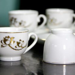 Bộ trà Camelia Sen Vàng kẻ chỉ vàng in logo VNAC12 Bộ trà Camelia Sen Vàng kẻ chỉ vàng in logo VNAC12