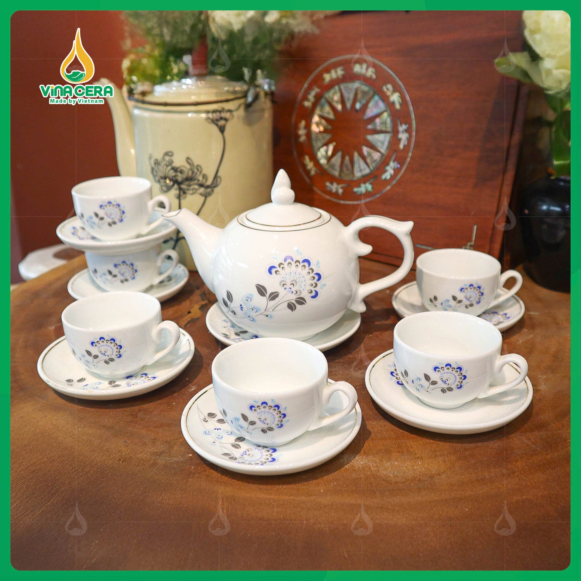 Bộ Ấm Chén Dáng Bưởi Chóp Ngọn Lửa In logo Đại Hội Đảng (16) Bộ Ấm Chén Dáng Bưởi Chóp Ngọn Lửa In logo Đại Hội Đảng
