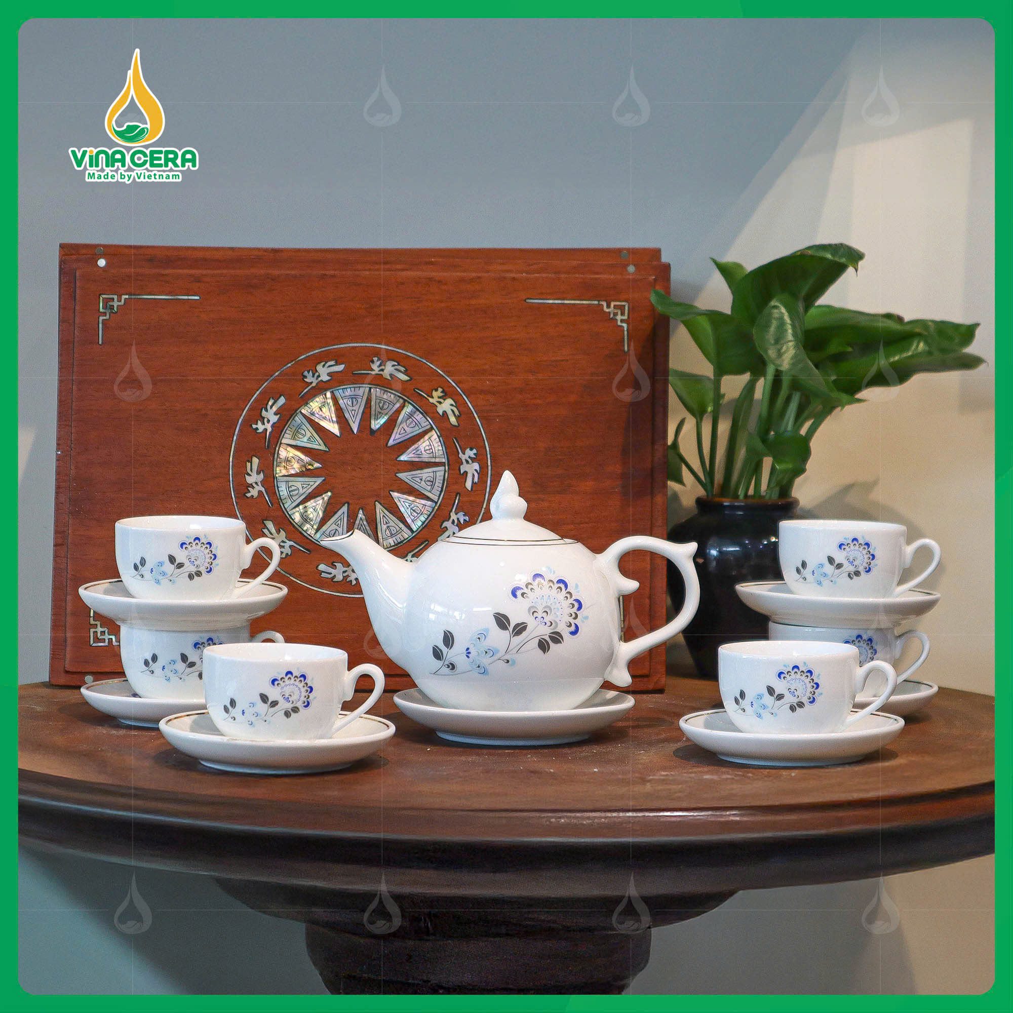Bộ Ấm Chén Dáng Bưởi Chóp Ngọn Lửa In logo Đại Hội Đảng (5) Bộ Ấm Chén Dáng Bưởi Chóp Ngọn Lửa In logo Đại Hội Đảng