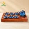 Bộ Ấm Chén Men Hỏa Biến Thanh Lam Dáng Siêu Quai Đồng Kèm Khay Gỗ Bộ Ấm Chén Men Hỏa Biến Thanh Lam Dáng Siêu Quai Đồng Kèm Khay Gỗ